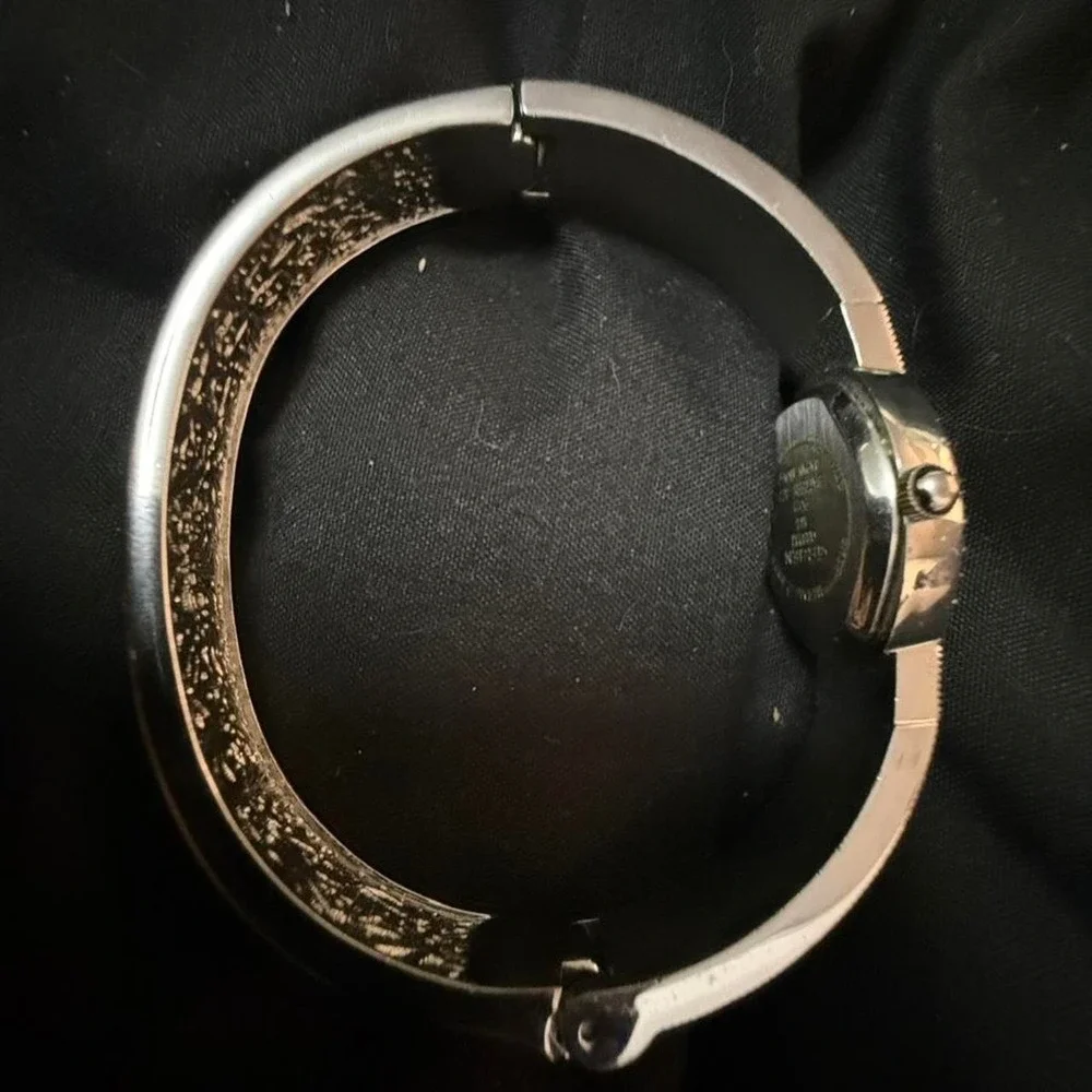 Gruen diamond watch with black and silver accents
